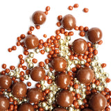 Pérolas de chocolate de leite e douradas (50 g)